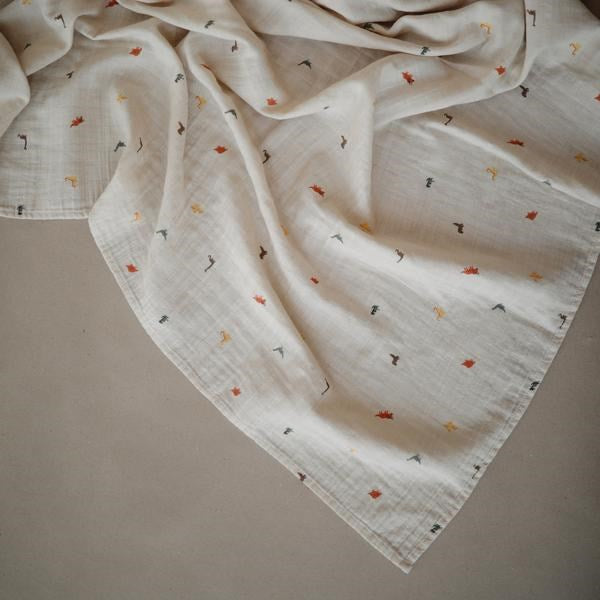 Mushie Muslin Swaddle Blanket Organic Cotton- Dinosaurs (7446572237026)